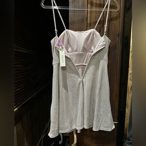 Cute cocktail dress. Size XS but can fit a S. Brand new, never worn.